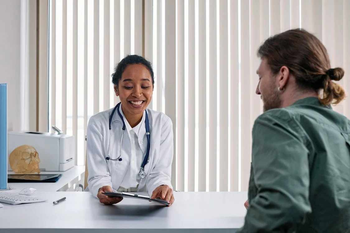 A healthcare professional discussing a personalized weight loss plan with a patient