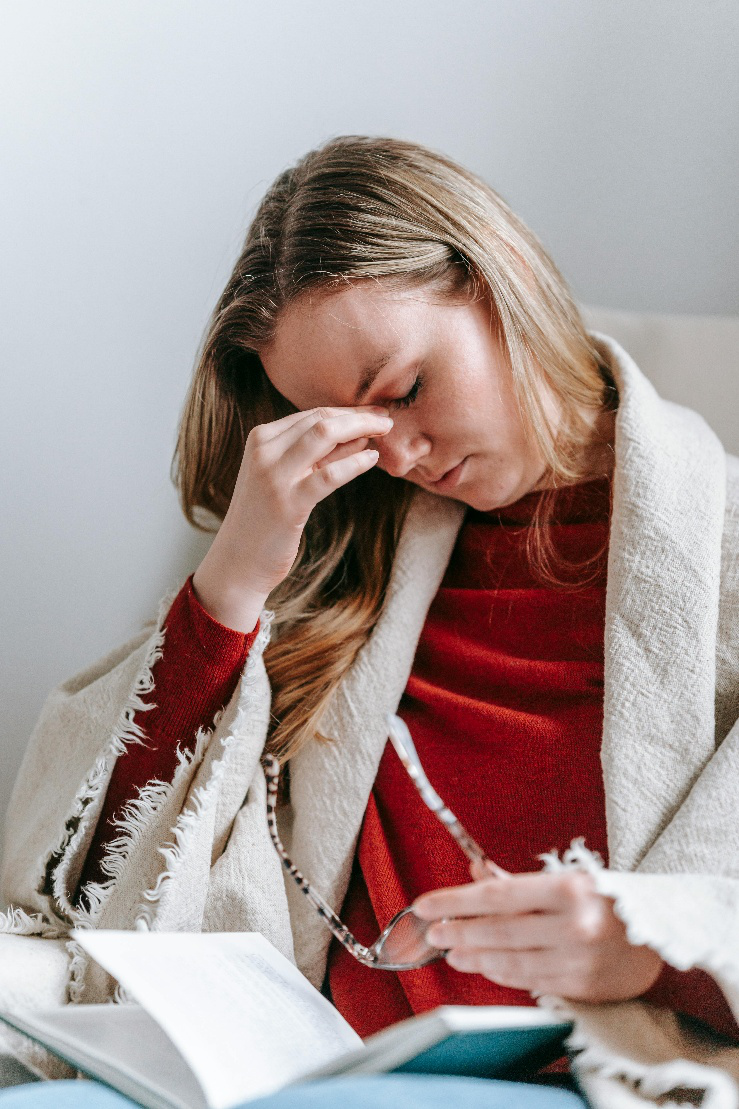 A picture of a person having a headache