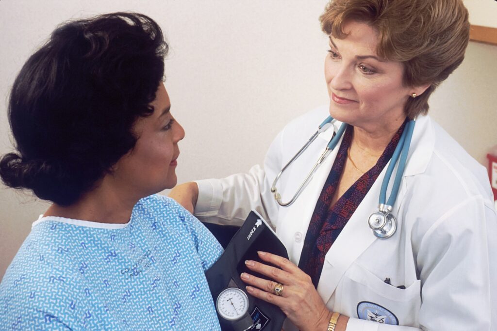 Woman consulting a healthcare provider about bioidentical hormone replacement therapy for menopause