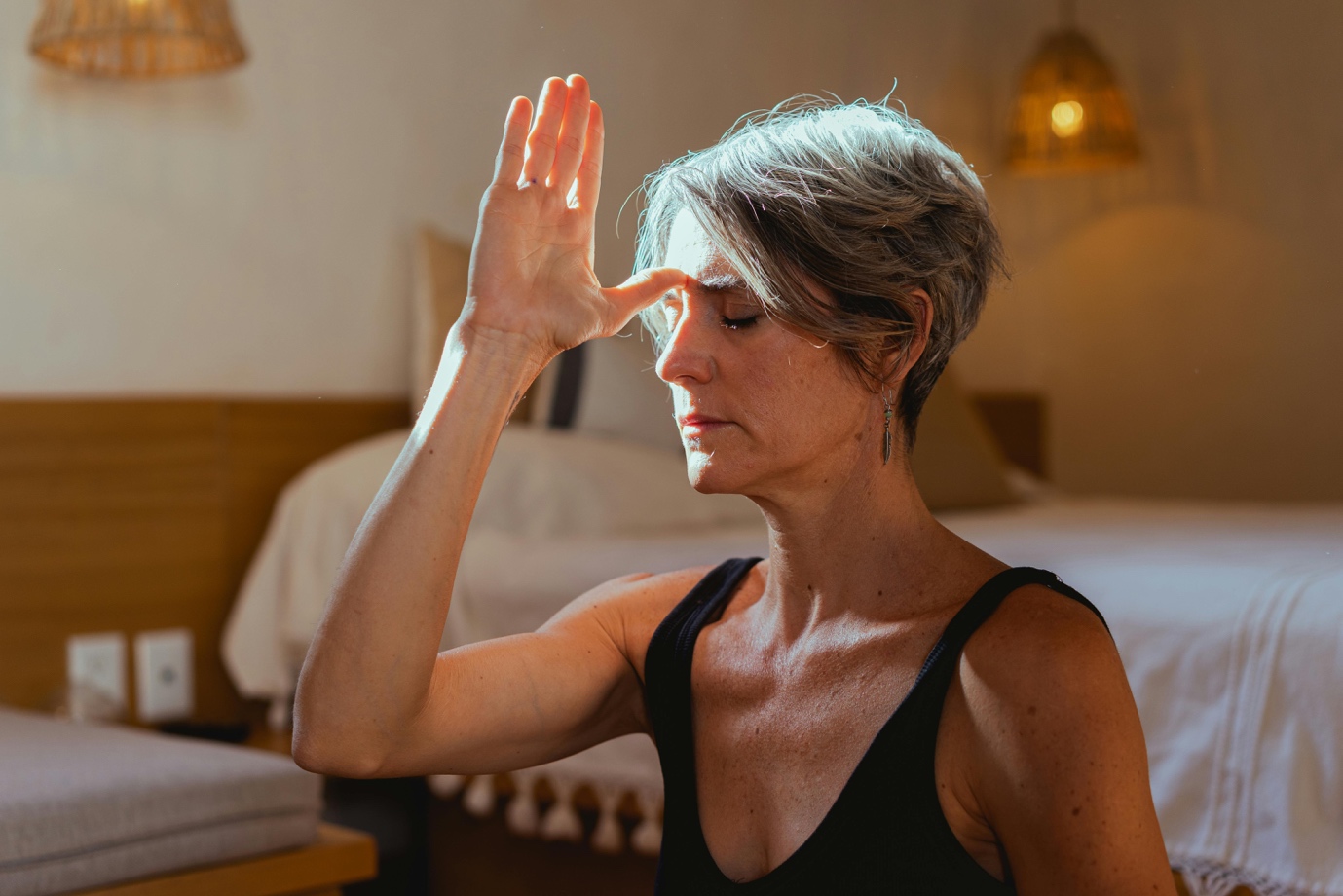Woman practicing yoga to support hormonal balance during menopause