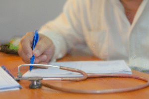 Healthcare professional reviewing hormone test results with a patient for weight loss